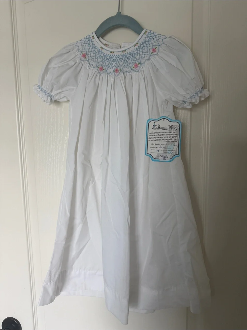 White Smocked Girls' Dress with Blue & Pink Embroidery